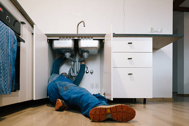 Professional Drain Cleaning technician working in Fairbank, IA